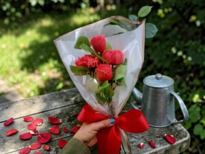 Ramo de rosas en vela